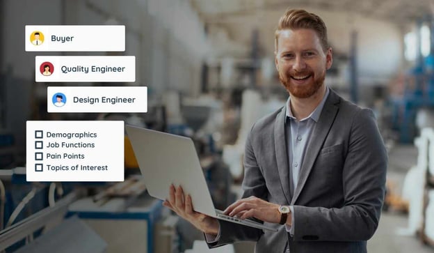 Business owner works on laptop on shop floor