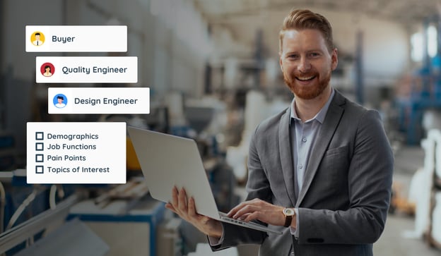 Business owner works on laptop on shop floor