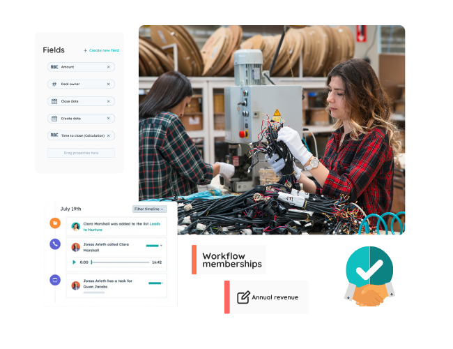 Assembly technicians organize cables at work bench