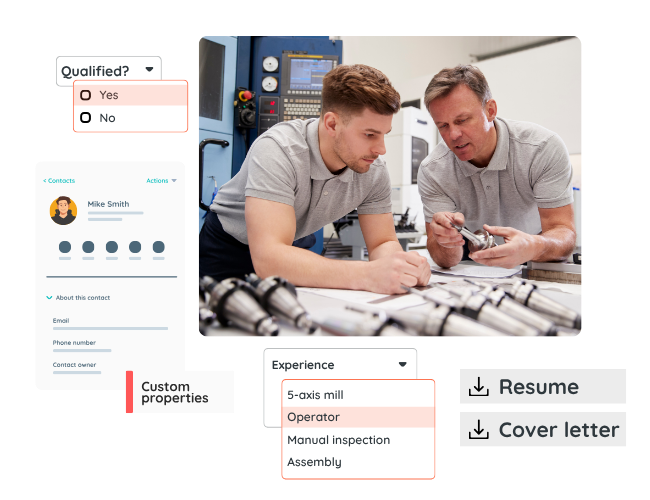 Setup machinist explains tooling to apprentice operator